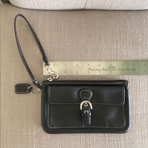 Coach SoHo Wristlet  New never used, Leather
